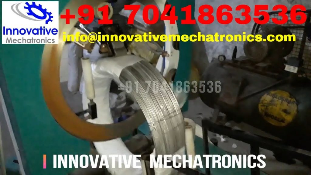 Coil wrapping machine for automatic binding of G.I wire. Coil wrapping machine for automatic binding of G.I wire.