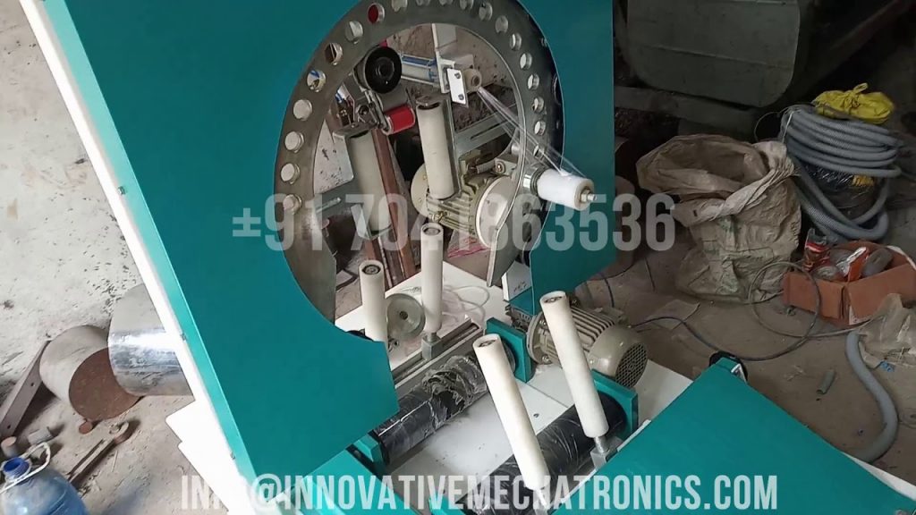 Wire wrapping machine for GI wire coils. Wire wrapping machine for GI wire coils.