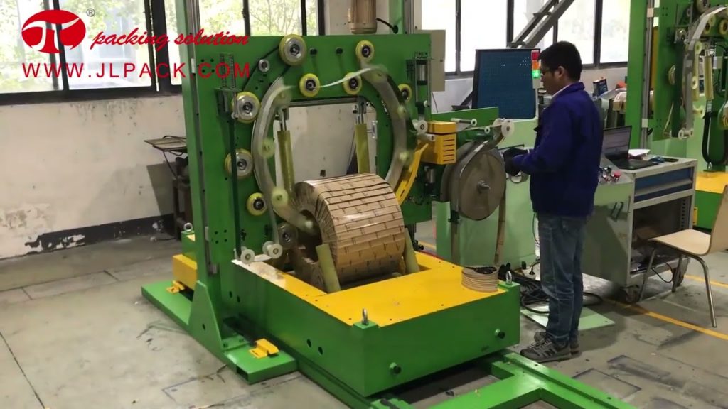 Compact steel coil wrapping machine. Compact steel coil wrapping machine.