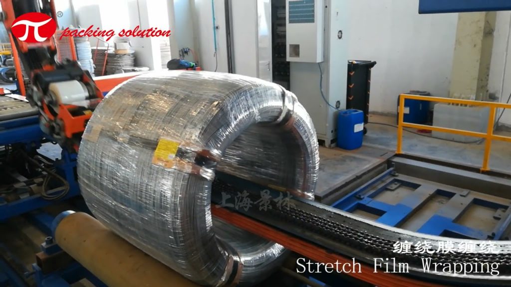 Coil wrapping machine for wide steel wire – concise and descriptive. Coil wrapping machine for wide steel wire – concise and descriptive.