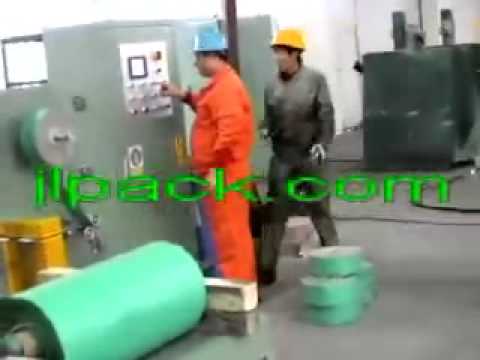 Wire coil packing machine for stretch wrapping and packaging of PC wire coils. Wire coil packing machine for stretch wrapping and packaging of PC wire coils.