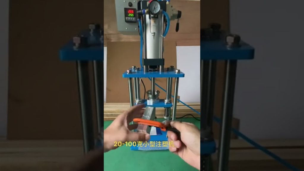 “Revolutionary Compact Pneumatic Injection Molding Machine for Desktop Labs – Unleash Precision and Versatility in Plastic Manufacturing”
