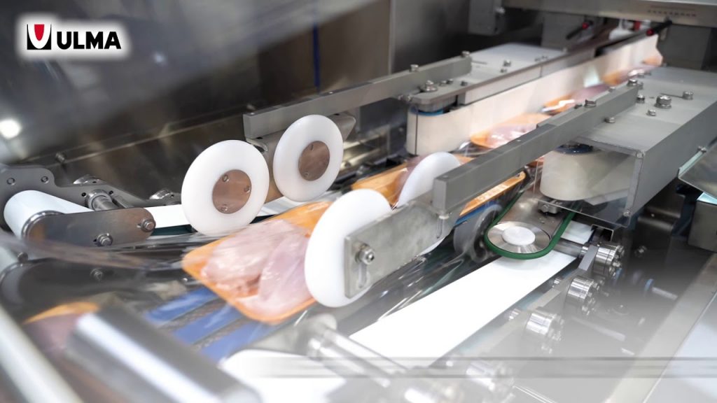Compact horizontal wrapper for meat and poultry trays.