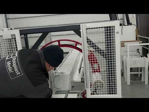 Compact horizontal wrapper stretches and secures items for shipping.