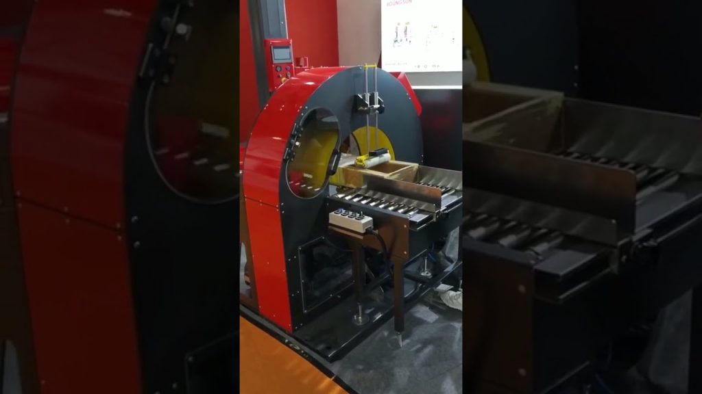 Compact stretch film wrapper for orbital wrapping machines.