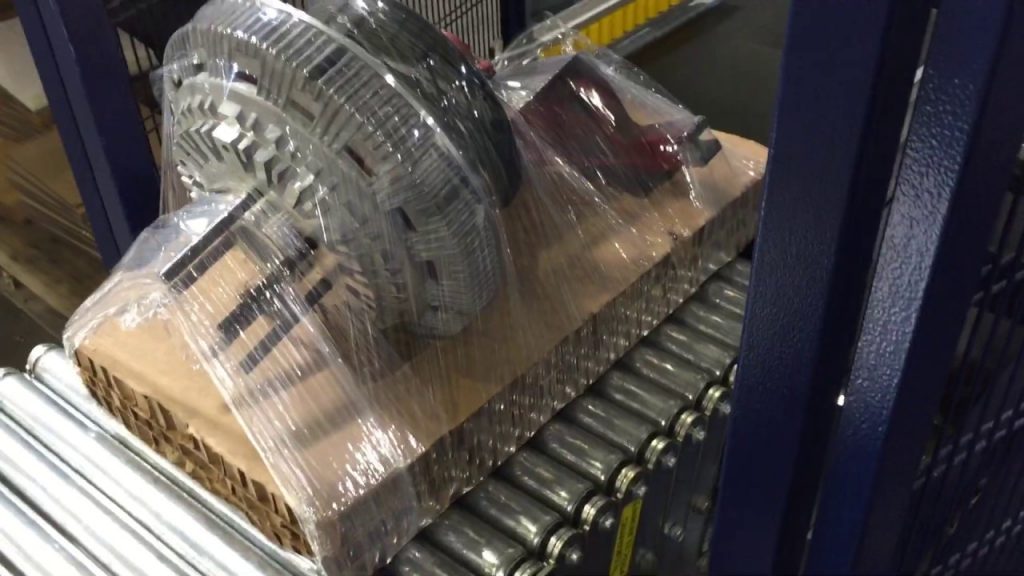 “Horizontal Stretch Wrapper for Wrapping Motors and Gearbox on Substrate”