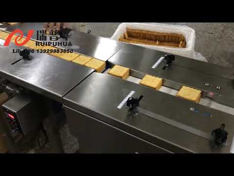 Horizontal flow wrap machine for biscuits and crackers in gusseted bags.