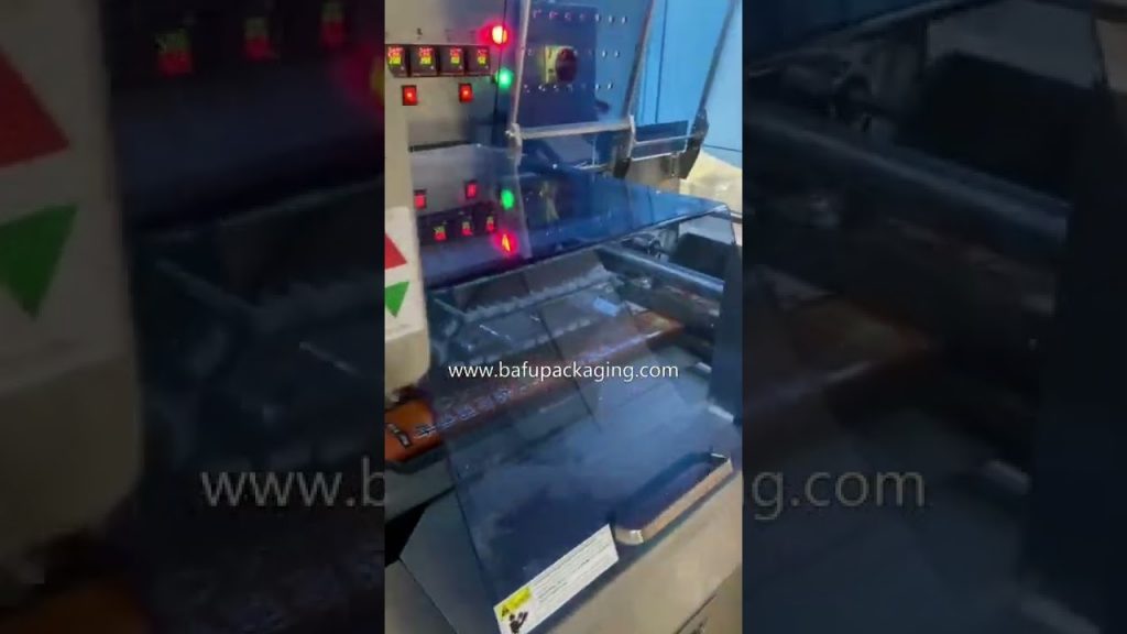 Packaging machine, automatic flow wrapper, pillow pack, horizontal packager.