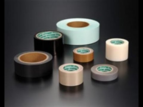 Pillow packing machine with PLC controller for adhesive tape.