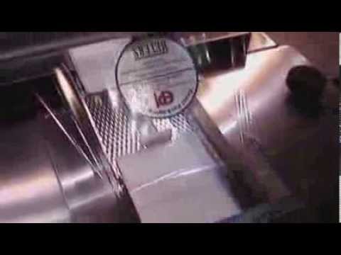 Shrinkwrapped Product Labeler: Horizontal Wrapping Simplified