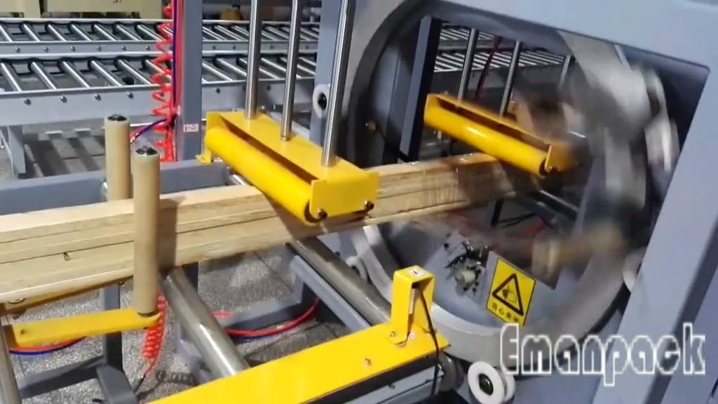 Wood bundle wrapper: Stretch film machine for orbital wrapping in under 12 words.