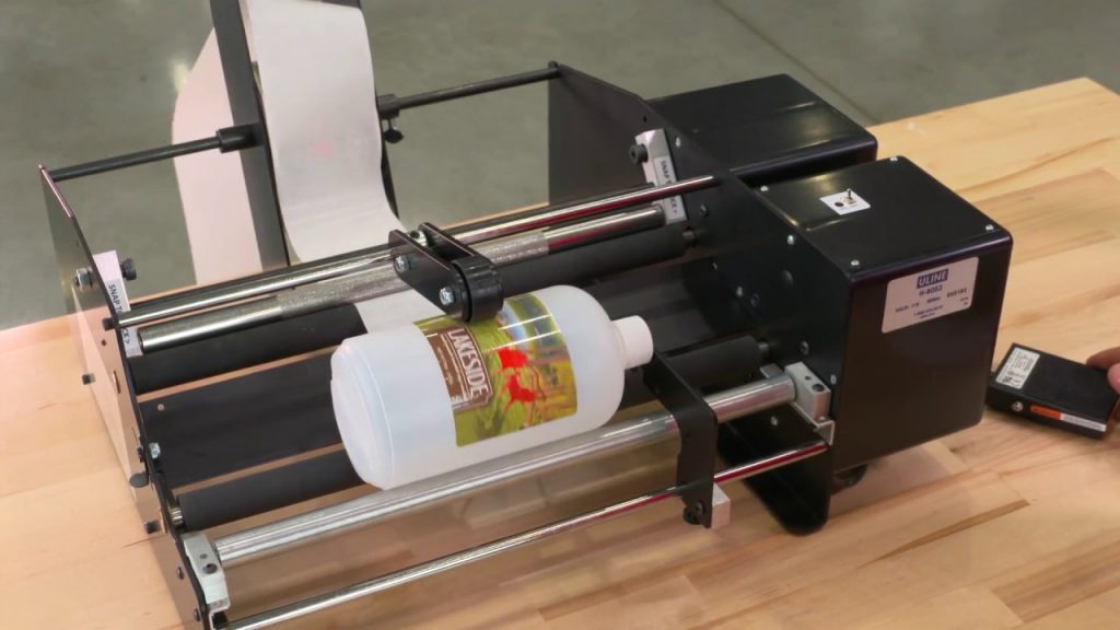 “Innovative Bottle Labeling Machine Revolutionizes Product Packaging with Bottle-Matic Label Applicator”