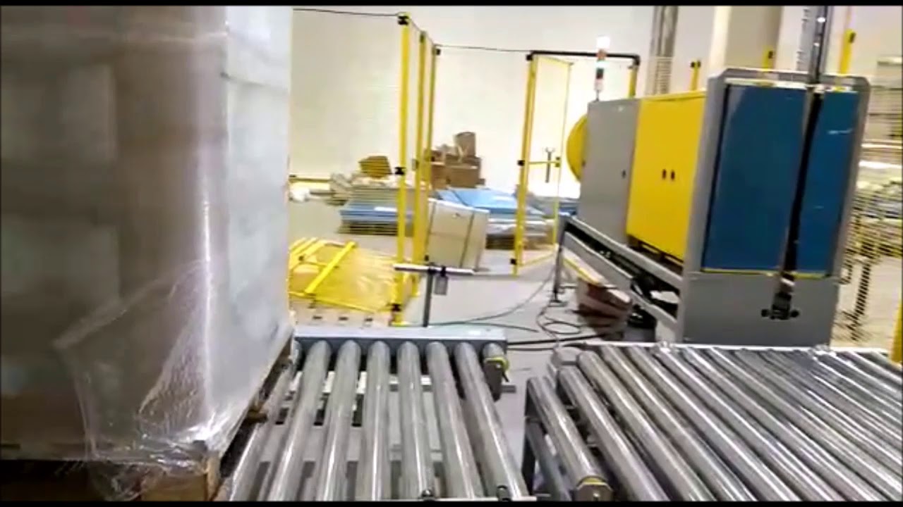 Revolutionary Automated Pallet Wrapping Strapping System For Efficient Packaging