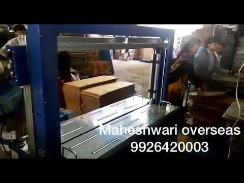 “Effortlessly Secure Packages with Innovative Automated Strapping Machine for Industrial Use”