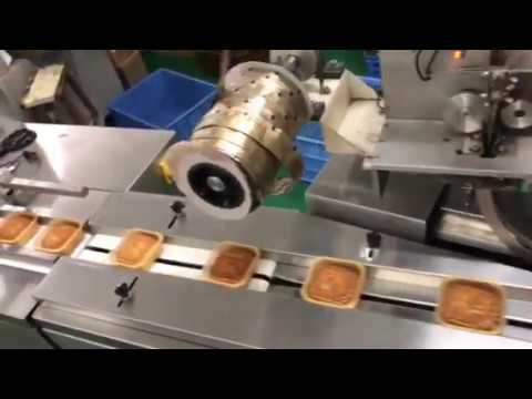 “Innovative Packaging System: Mooncake Automatic Flow Packing Machine with Deoxidant Dispenser Enhances Food Safety”