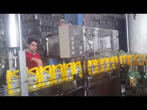 “Innovative Packing Solution for Industrial Oil: 1-4L Oil Filling Machine and Packaging Line”