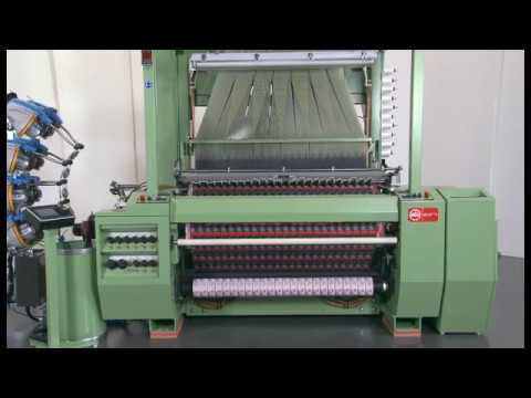 “Revolutionary Air Jet Label Weaving Machine: Unmatched Precision for Labels and Woven Images with Cut Selvedge”